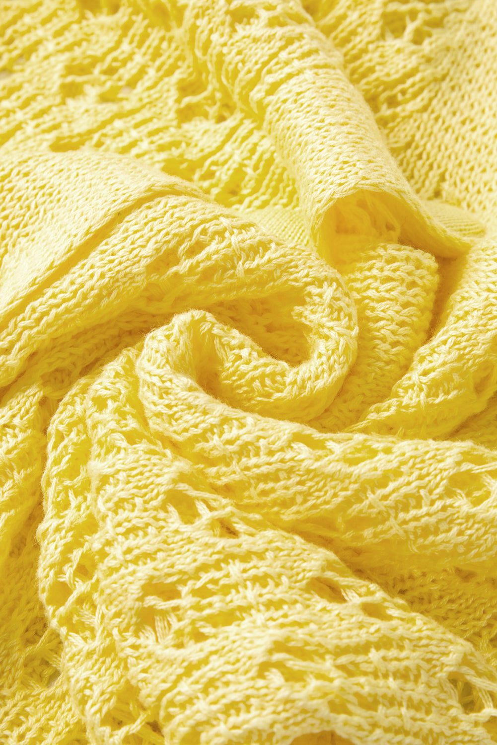 Gelber pointelle-strickpullover mit v-ausschnitt strickjacke