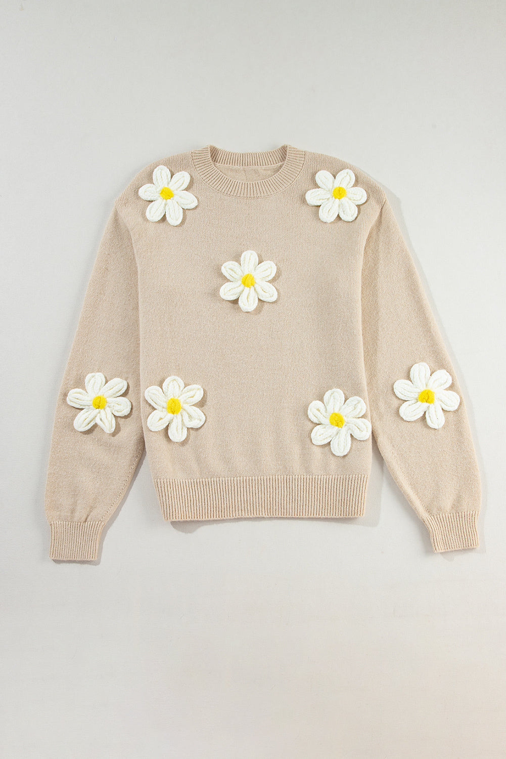 Pergamentfarbener, gehäkelter grobstrick-pullover