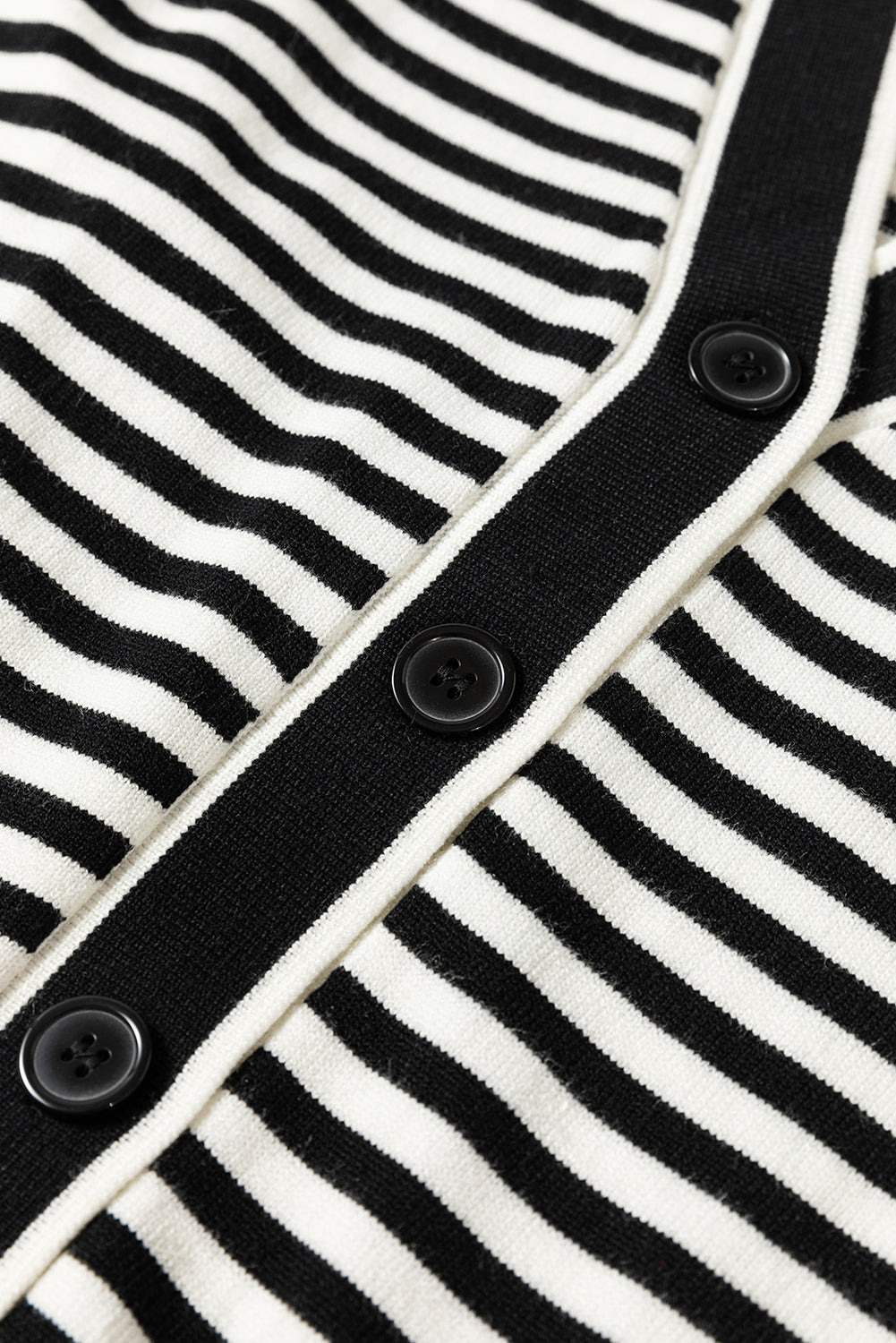 Schwarz gestreifte langarm-tunika-strickjacke