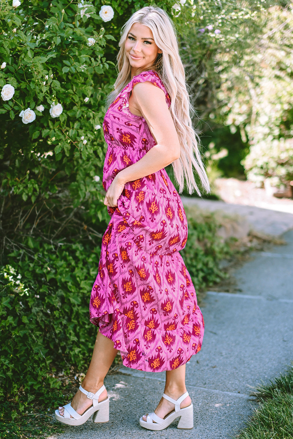 Bonbon retro print met gedraaide voorkant en verzamelde mouwen maxikleid