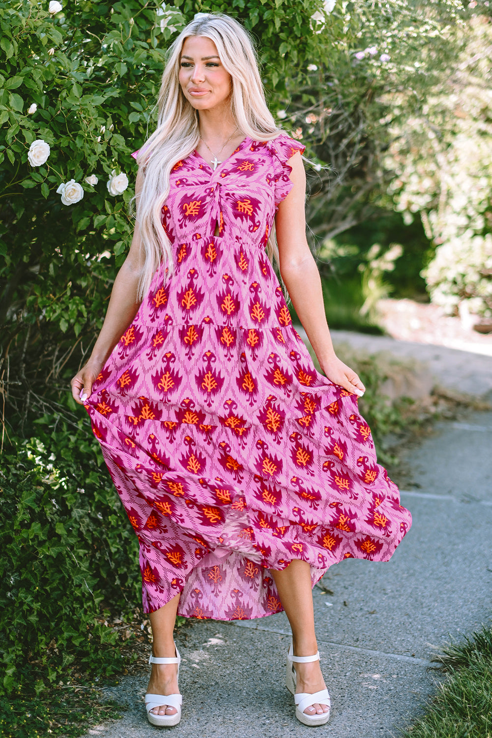 Bonbon retro print met gedraaide voorkant en verzamelde mouwen maxikleid