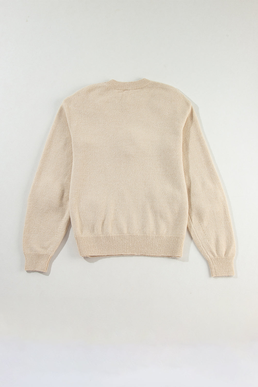 Pergamentfarbener, gehäkelter grobstrick-pullover