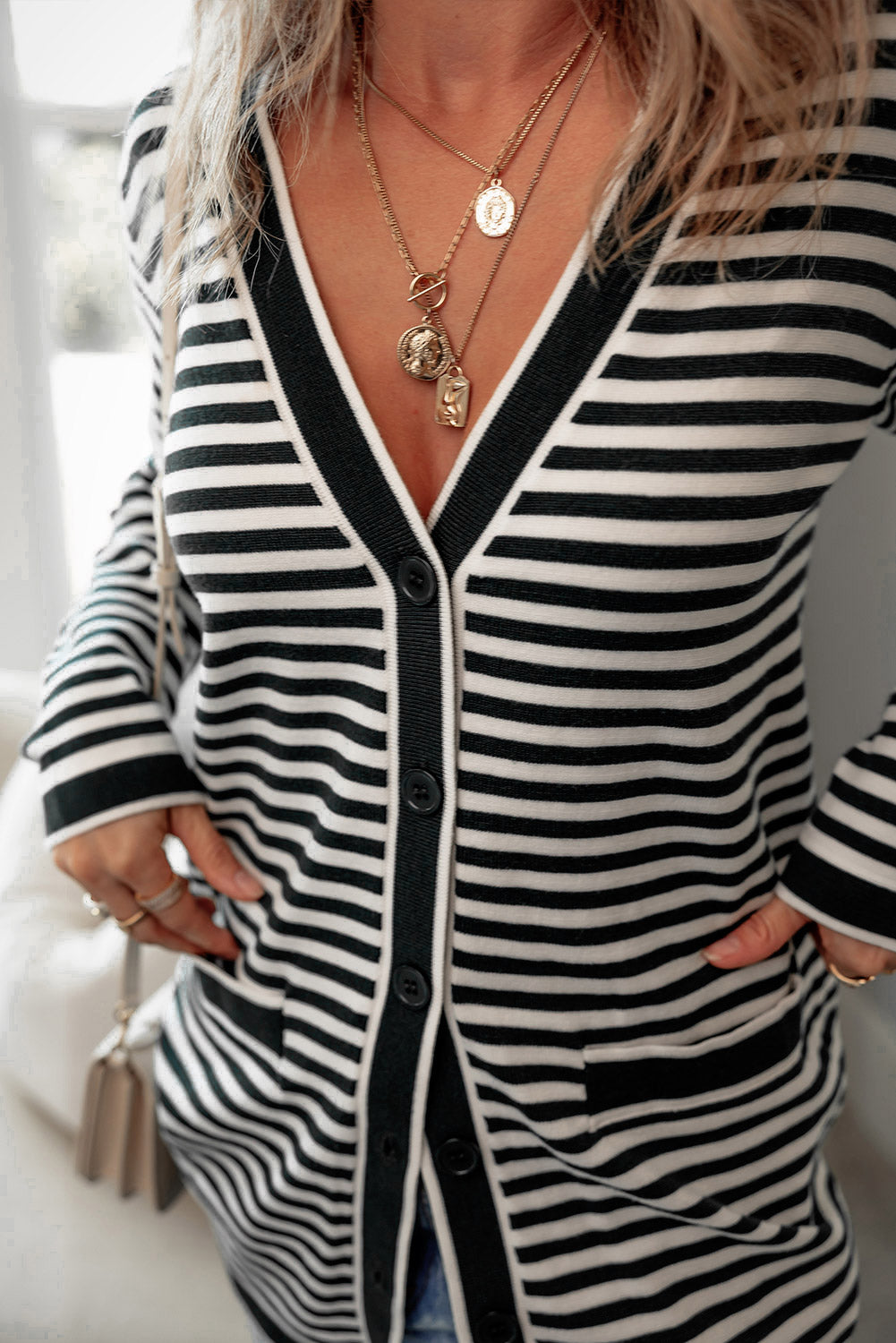 Schwarz gestreifte langarm-tunika-strickjacke