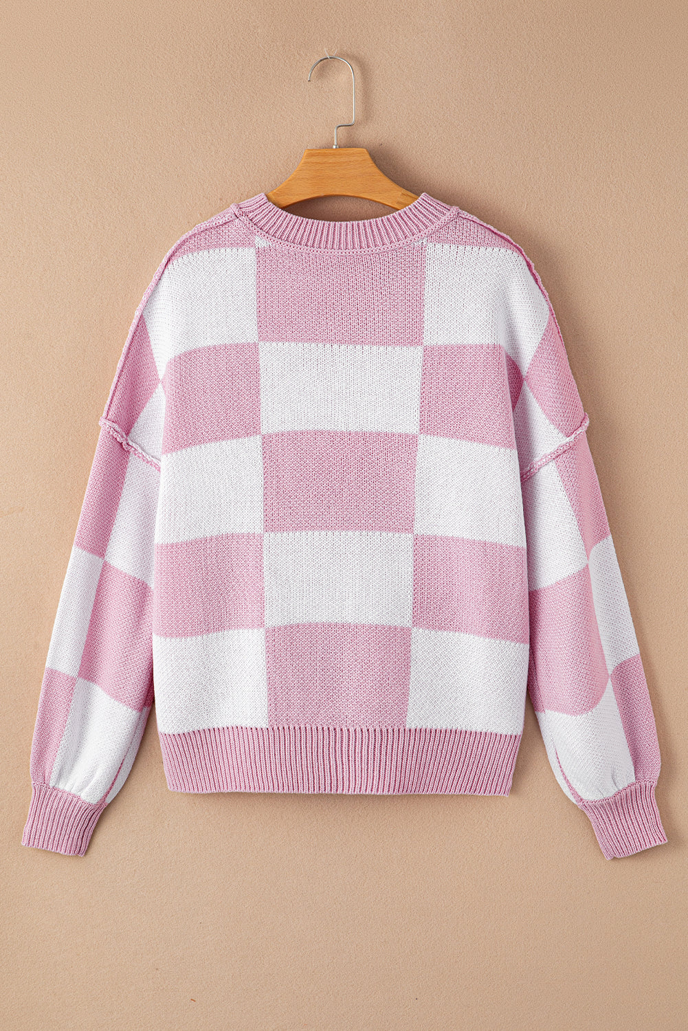 Rosa karierter pullover mit läuferärmeln