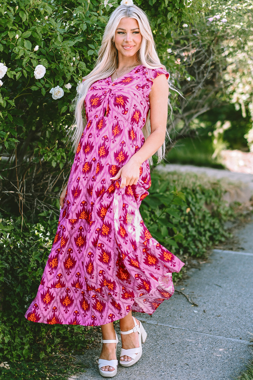 Bonbon retro print met gedraaide voorkant en verzamelde mouwen maxikleid