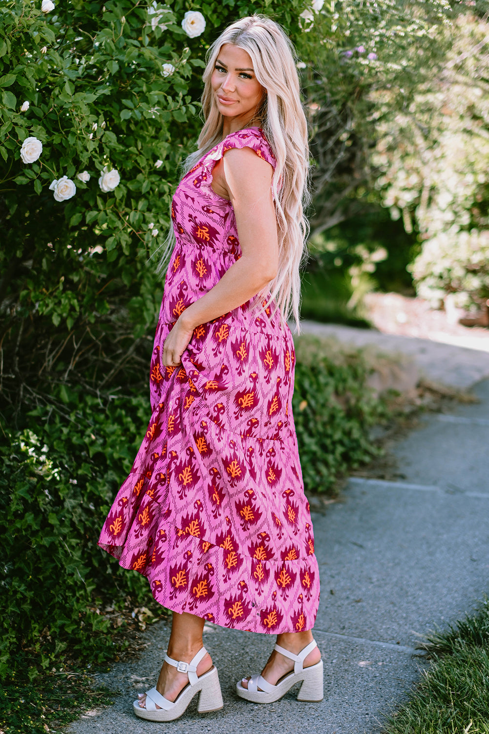 Bonbon retro print met gedraaide voorkant en verzamelde mouwen maxikleid