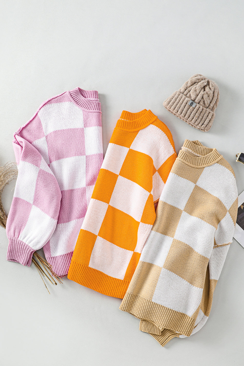 Rosa karierter pullover mit läuferärmeln