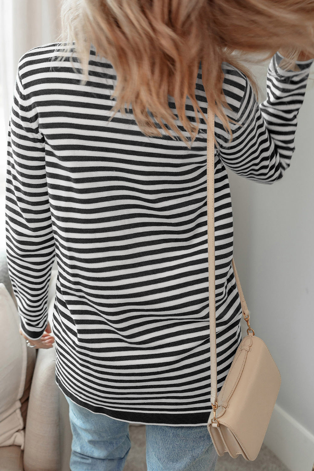 Schwarz gestreifte langarm-tunika-strickjacke