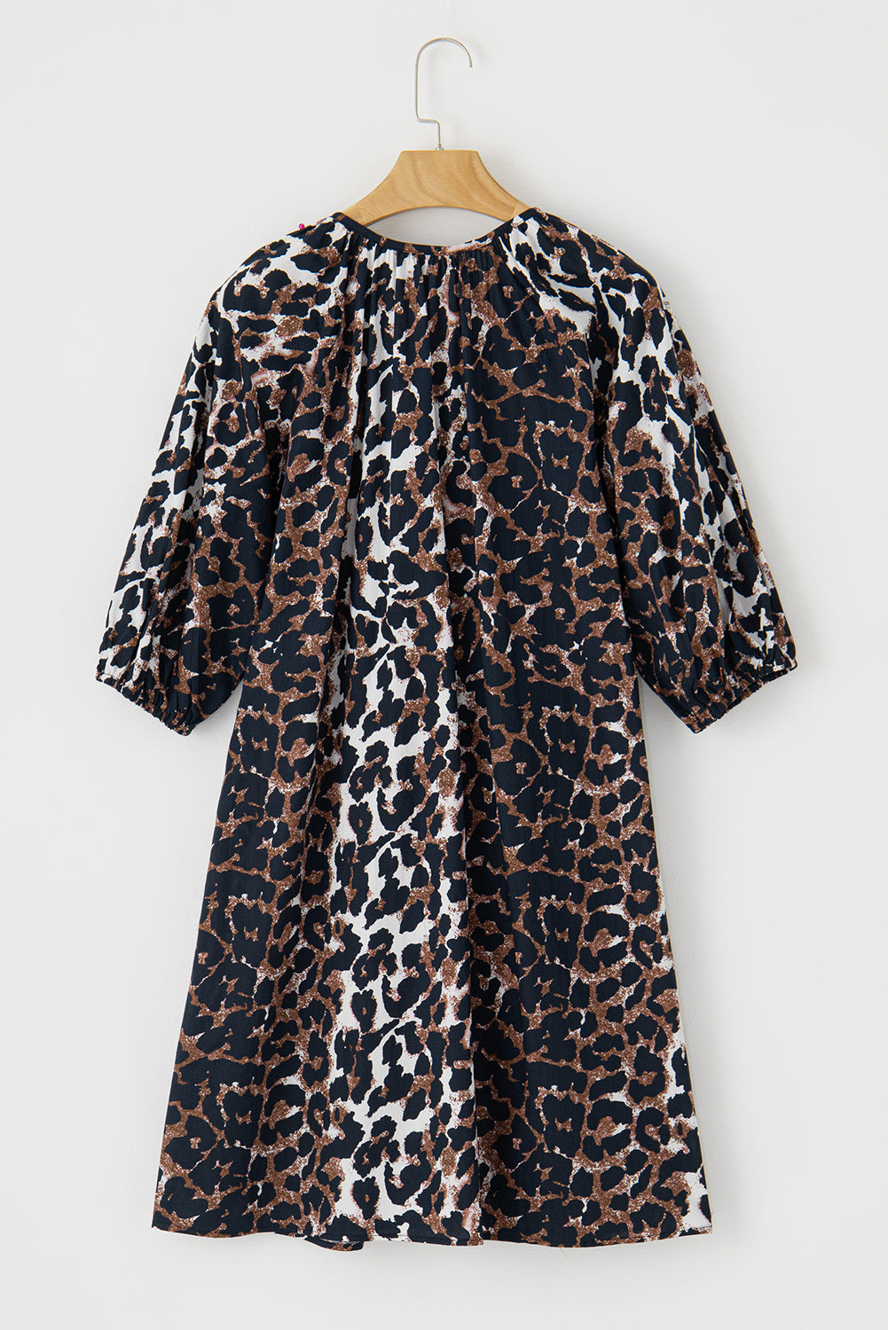 Zwart luipaard shirtjurk met poepenmouwen en knoopsplacket