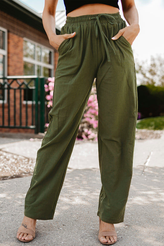 Groene broek met een koord en elastische taille lange, rechte broekpoten