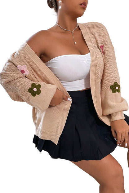 Rauchgraue strickjacke mit blumenapplikationen und blasenärmeln an den schultern