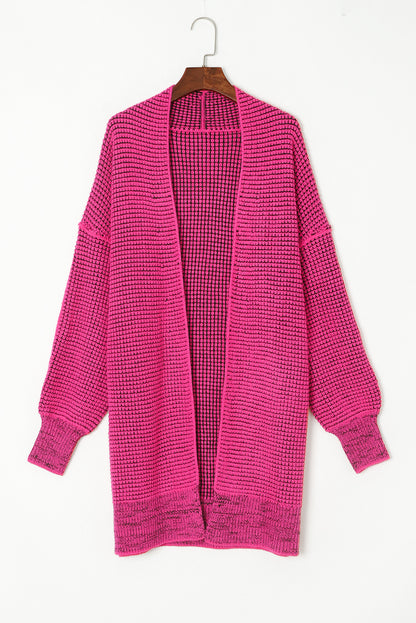 Rosa karierte strickjacke mit offener vorderseite