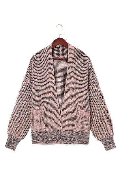 Roze vest met wafel gebreide en oversized kraag