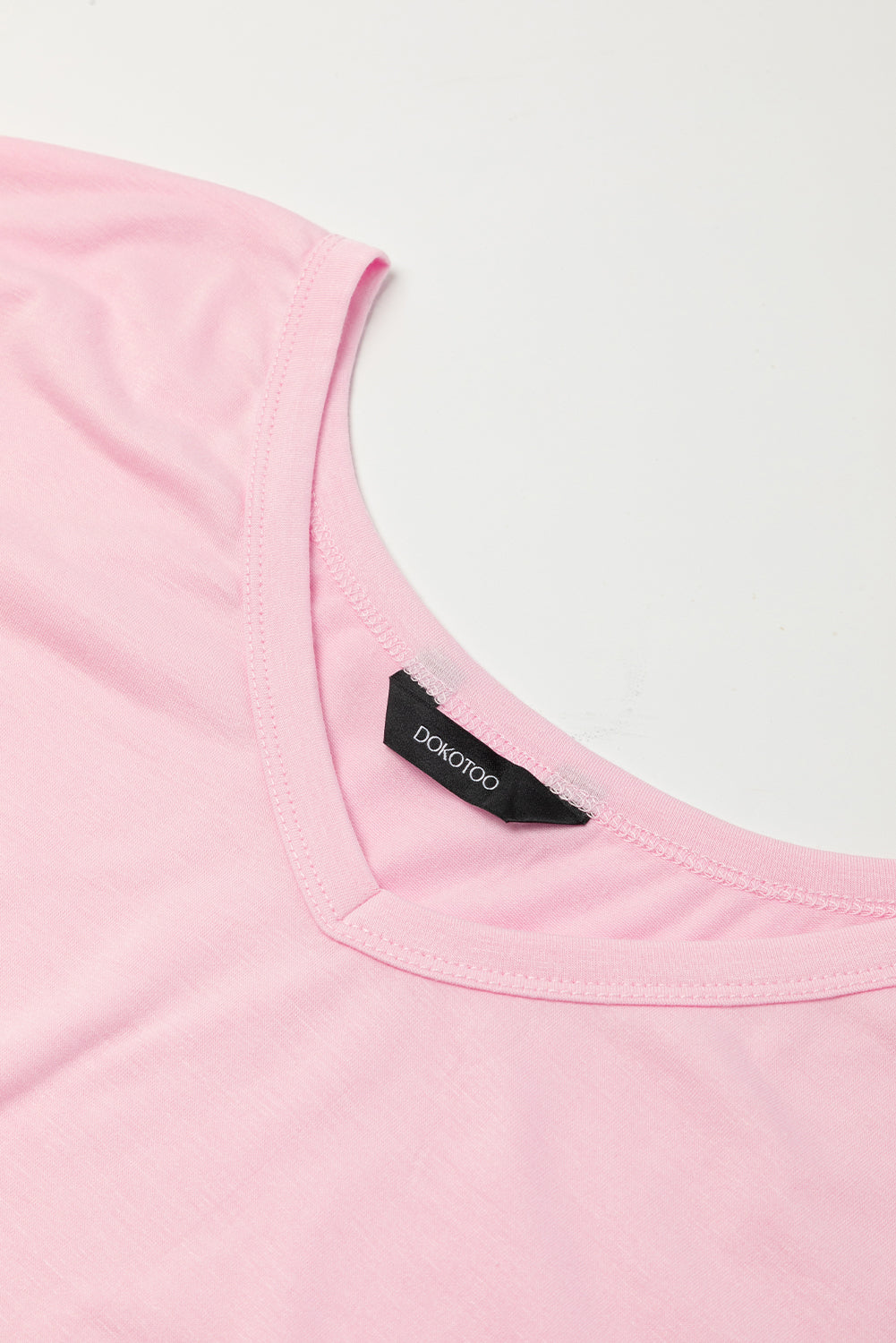 Rosa V-halslijn met verborgen pocket slots maxi t-shirt jurk