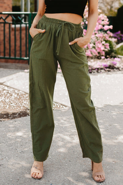 Groene broek met een koord en elastische taille lange, rechte broekpoten