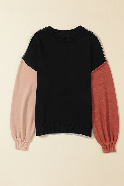 Schwarzer colorblock-pullover mit gerippten ärmeln