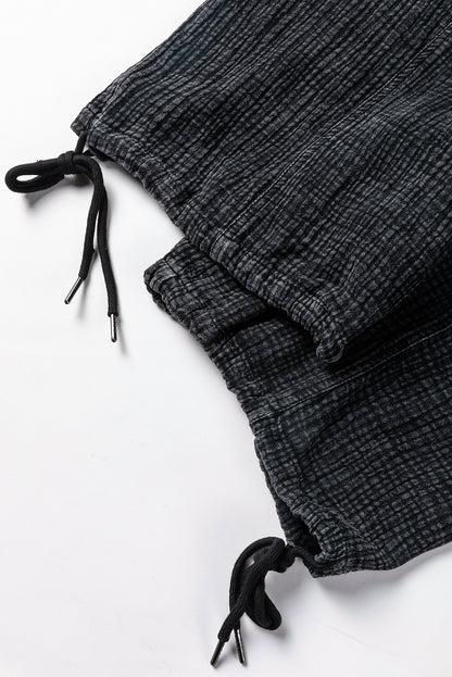 Black Mineral Washing Structured Trousers met een wijde poot met een snoertrek