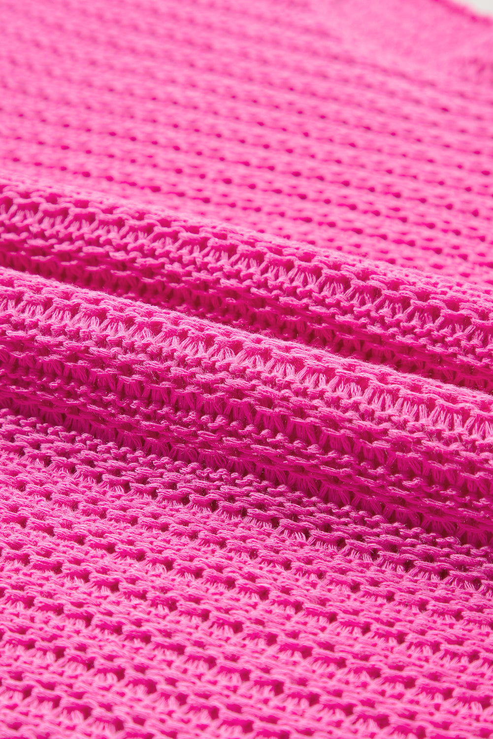 Roze massieve, losse brei -trui met korte Dolman -mouwen