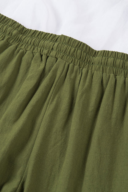 Groene broek met een koord en elastische taille lange, rechte broekpoten