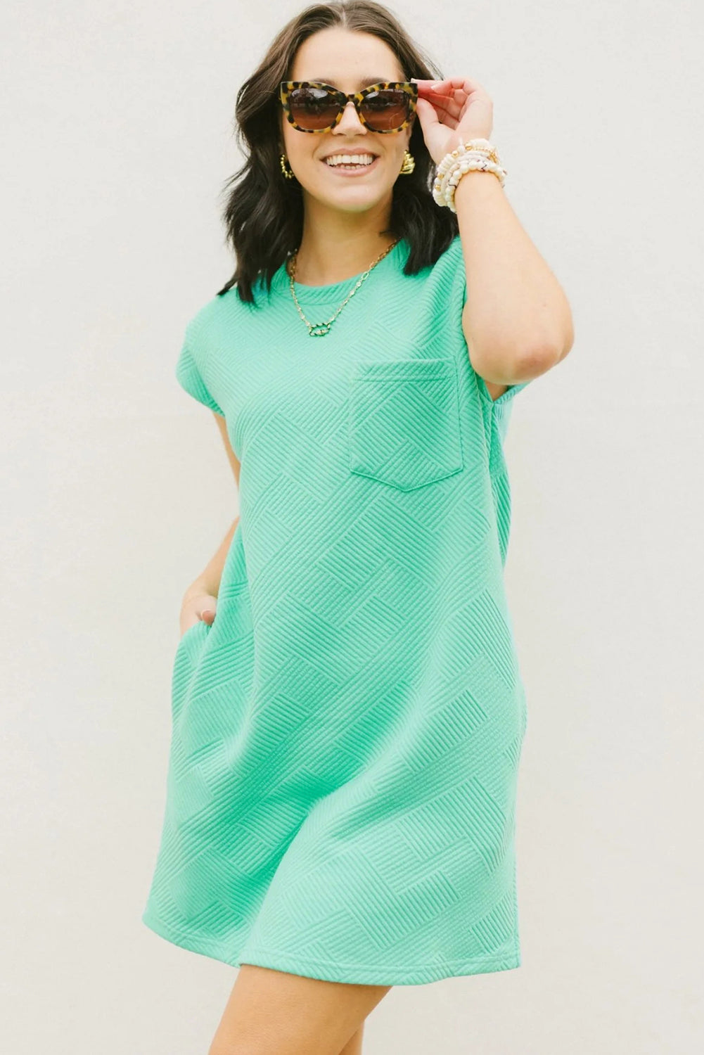 Mint groen gestructureerde t-shirtjurk met lange mouwen