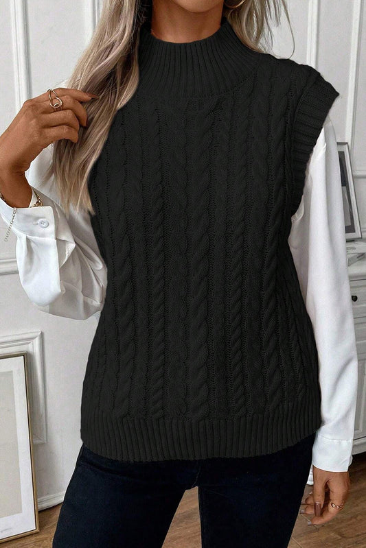 Schwarzer kabelstrickpullover mit hohem halsausschnitt