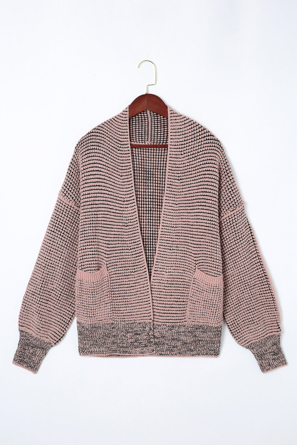 Roze vest met wafel gebreide en oversized kraag