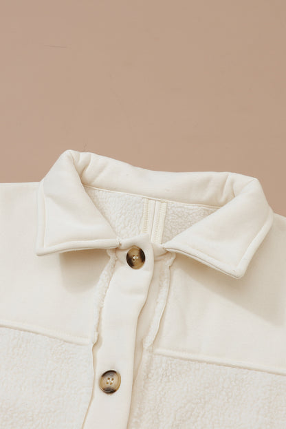 Beige knop Placket met naadzak ruw zoom jas