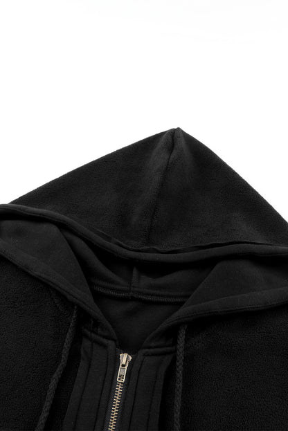 Schwarze klappentasche mit kordelzug kapuze zip up jacke