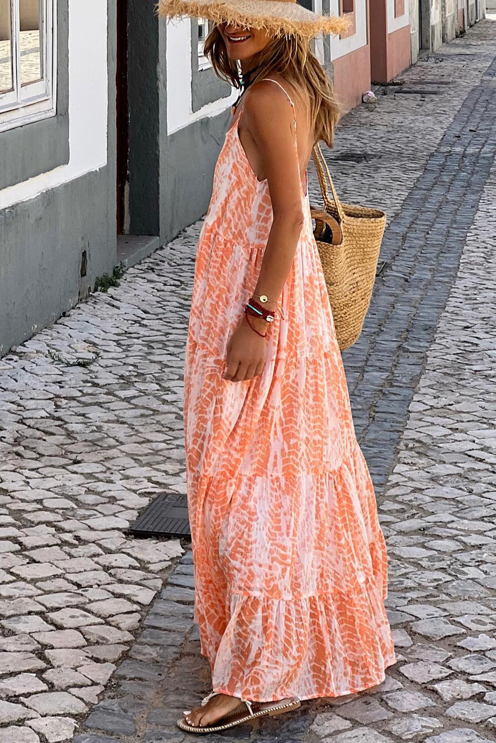 Abstract oranje spaghetti-riem maxi-jurk met rugvrije riemen