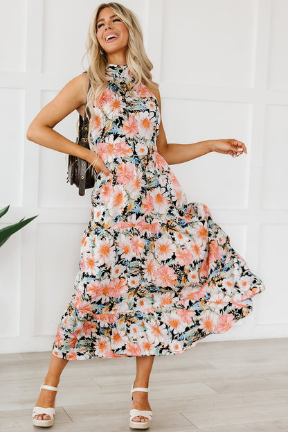 Schwarzes boho-maxikleid mit geknotetem halter und rüschen