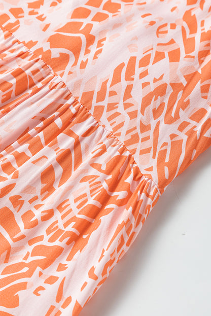 Abstract oranje spaghetti-riem maxi-jurk met rugvrije riemen