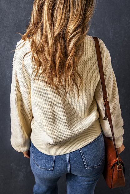 Beige eenvoudig vest met een v-neck en knoppen