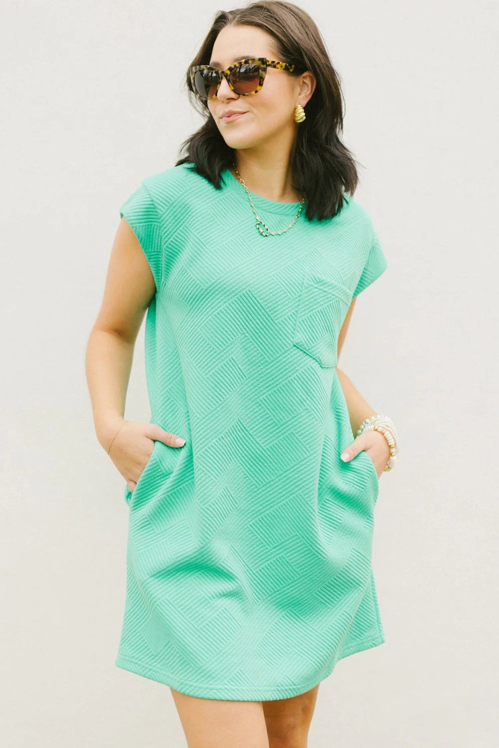 Mint groen gestructureerde t-shirtjurk met lange mouwen