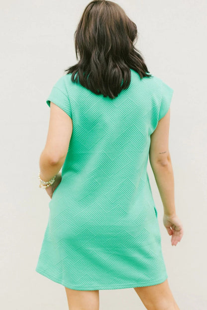 Mint groen gestructureerde t-shirtjurk met lange mouwen