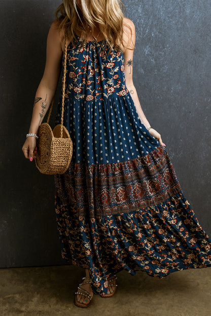 Blauwe mouwloze maxi-jurk in boho-stijl met bloemendecoratie