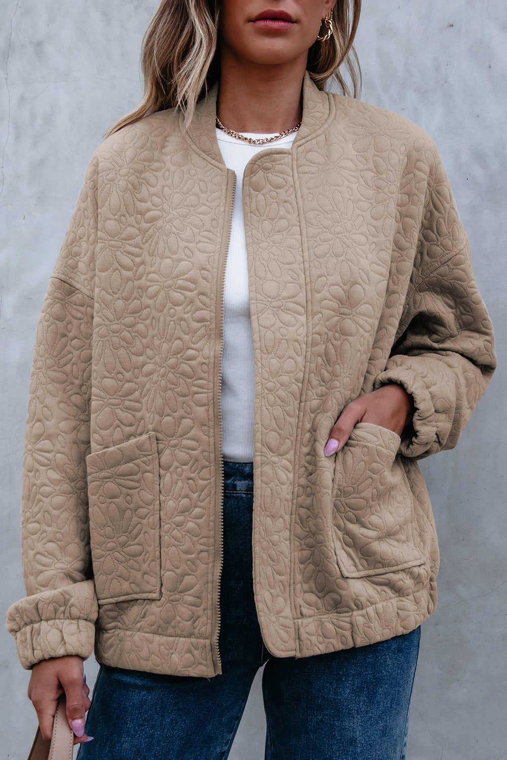 Gesteppte jacke in hellem french beige mit blumenmuster