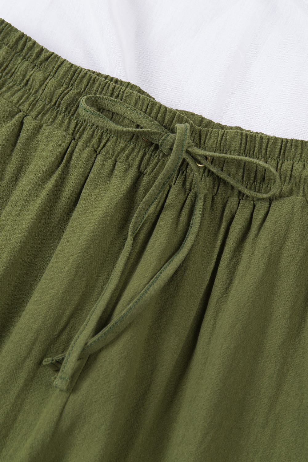 Groene broek met een koord en elastische taille lange, rechte broekpoten