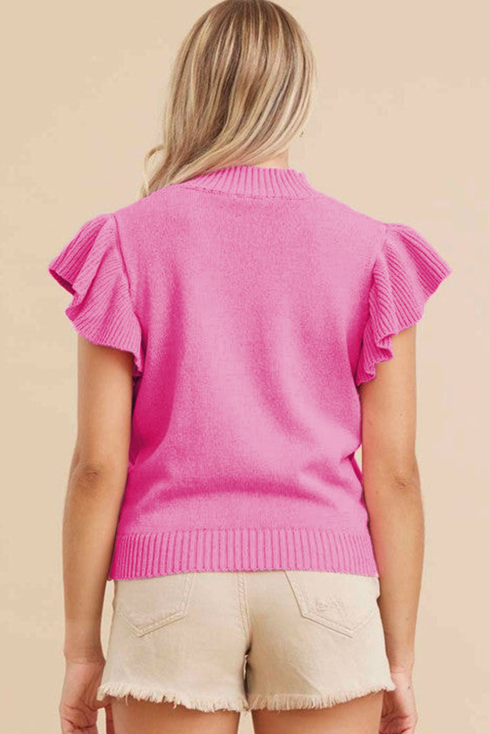 Bonbon geribbel mock neck sweater met korte mouwen en ruches