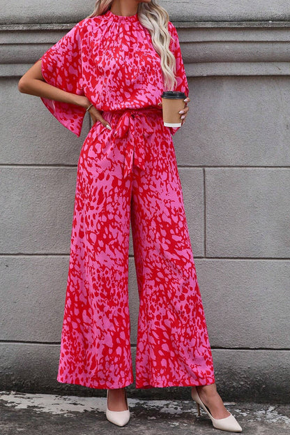 Roze luipaard losse mouwgordel met een wide been jumpsuit