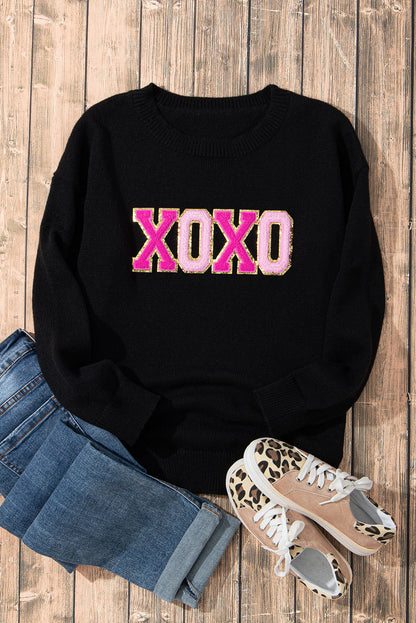 Schwarzer xoxo glitter print rundhalsausschnitt casual pullover