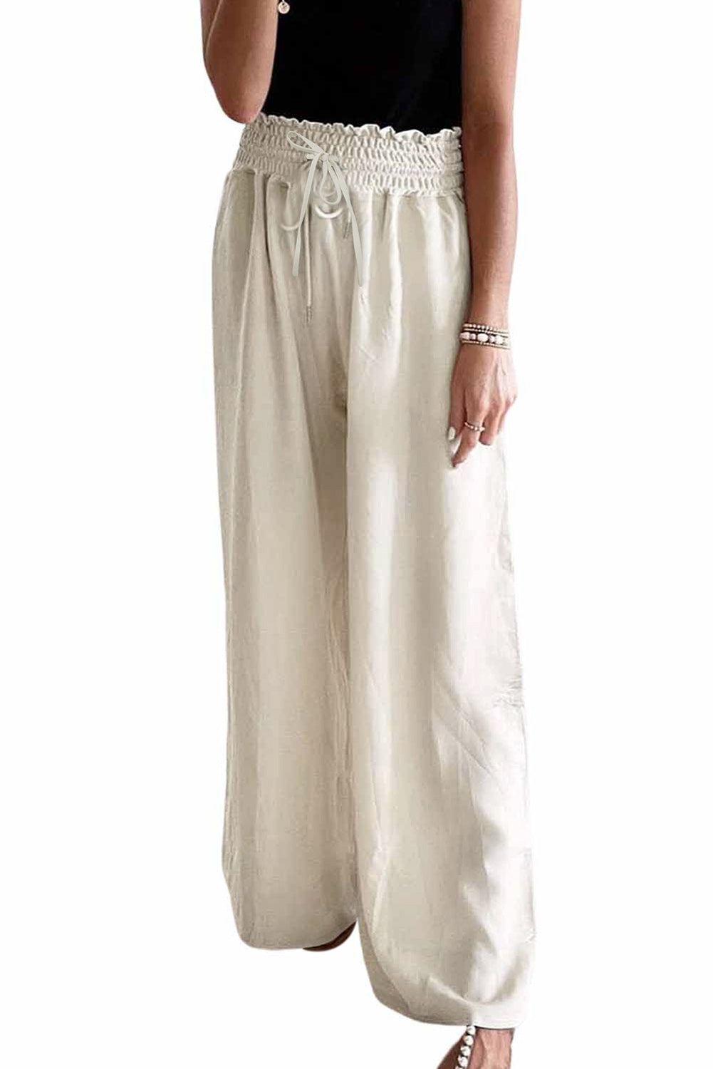 Beige gesmokte hose mit hoher taille und weitem bein