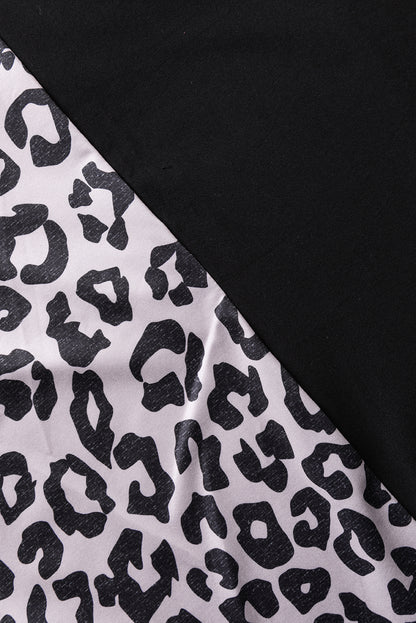 Schwarzes halb-leopard-patchwork-t-shirt in übergröße