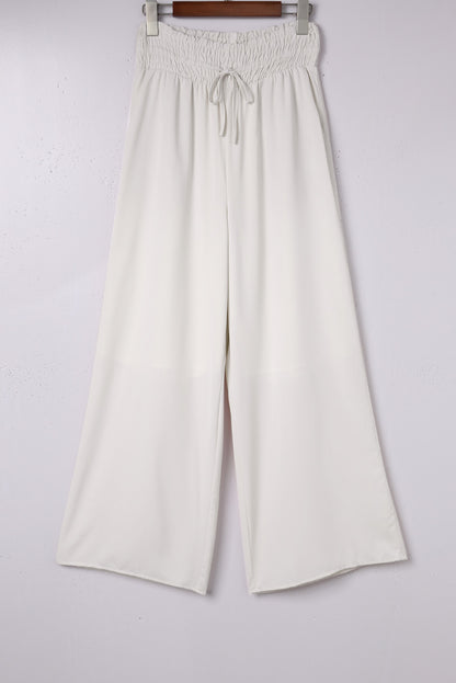 Beige gesmokte hose mit hoher taille und weitem bein