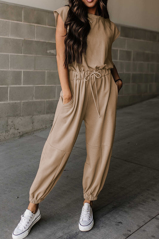 Lichte Franse beige cap mouw open rug trekstring jogger jumpsuit