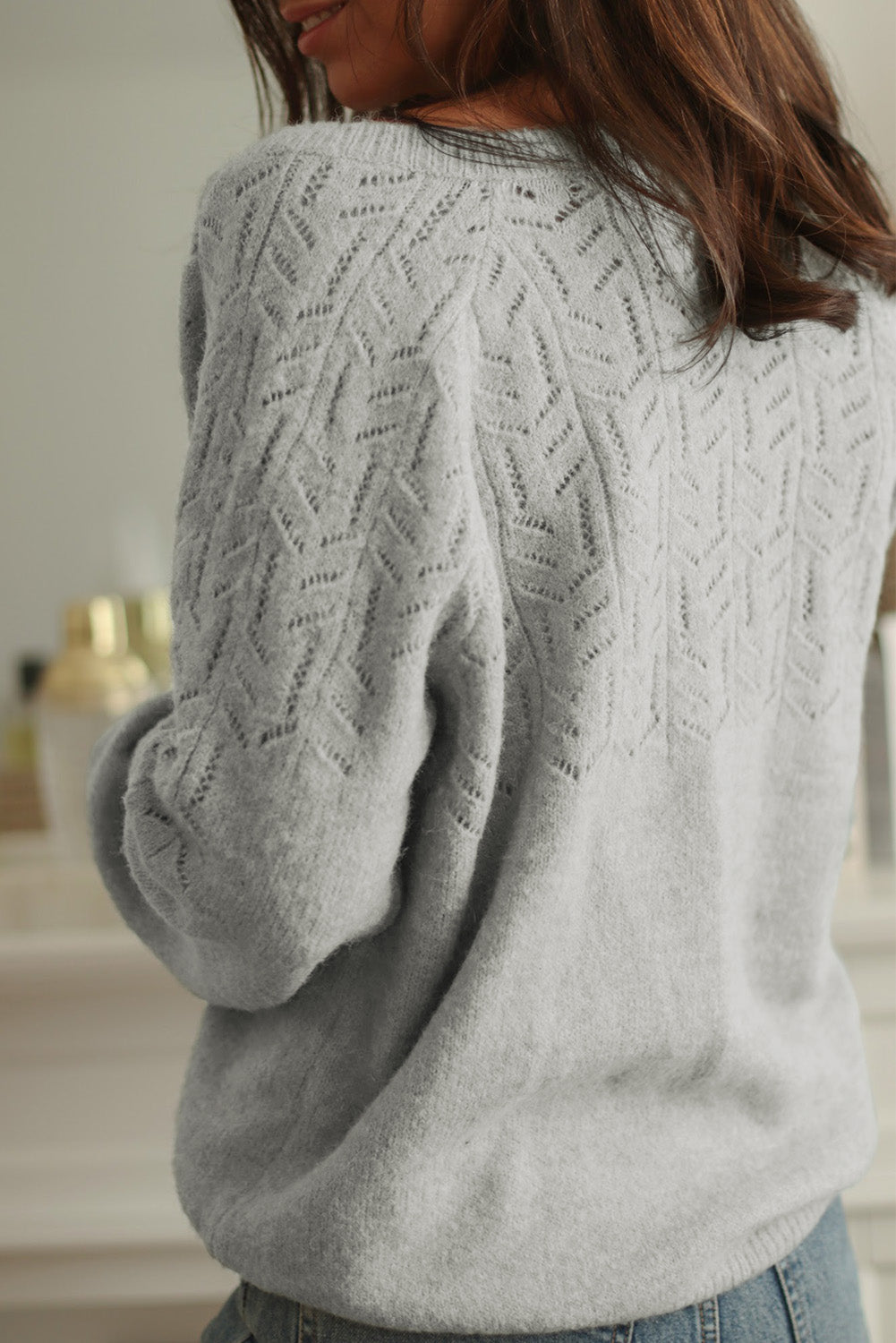 Geknöpfter strickcardigan mit lochmuster