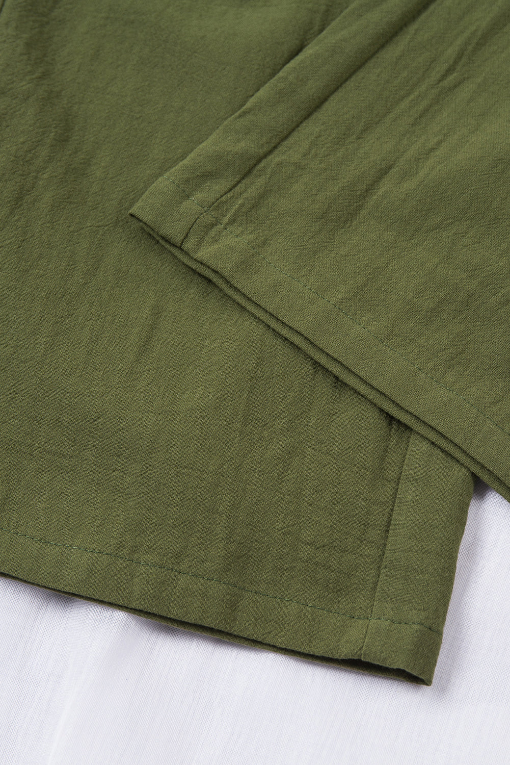 Groene broek met een koord en elastische taille lange, rechte broekpoten