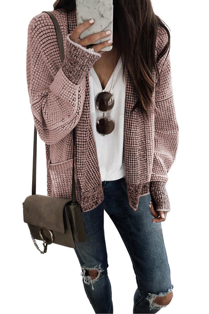 Roze vest met wafel gebreide en oversized kraag