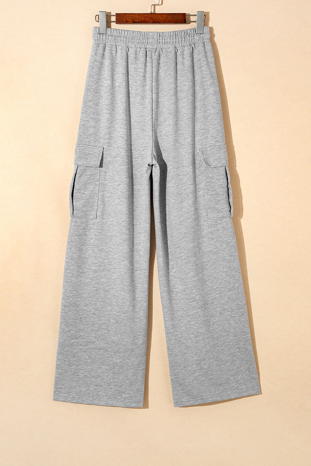 Hellgraue cargo-sweatpants mit kordelzug an der taille