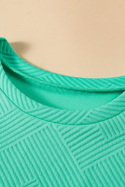 Mint groen gestructureerde t-shirtjurk met lange mouwen