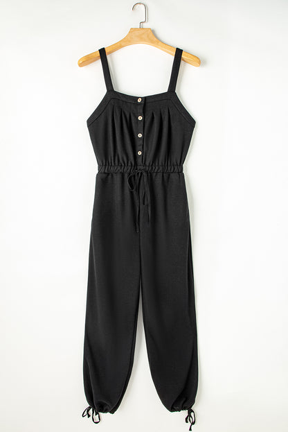 Zwarte jumpsuit met geknoopte riemen en gestructureerde snoerstam